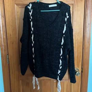 Black and cream lace up v neck sweater